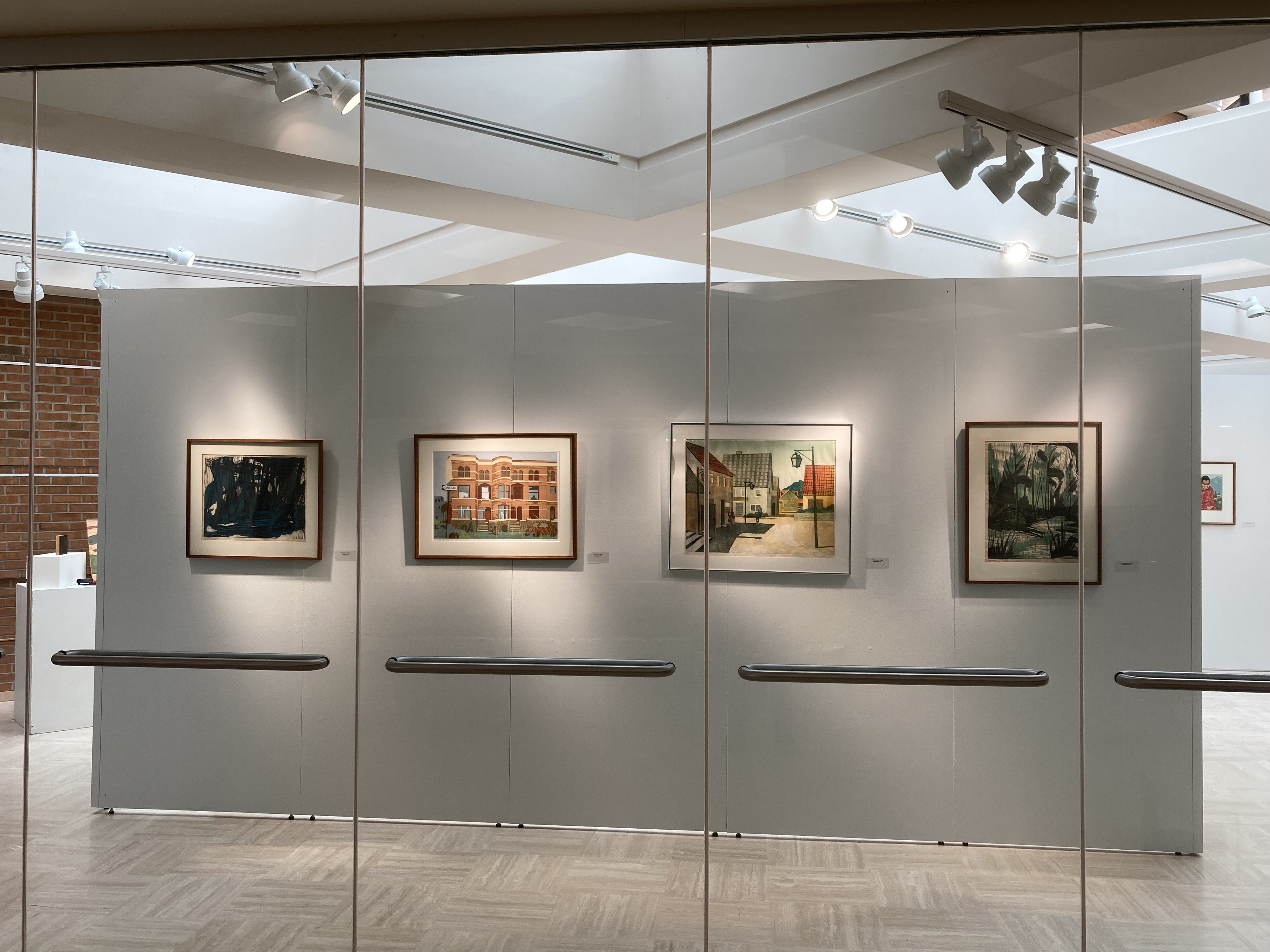 Quint prints looking through the glass wall